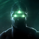 A screenshot of Tom Clancy's Splinter Cell's Sam Fisher, with his multi-vision goggles glowing green in the dark.